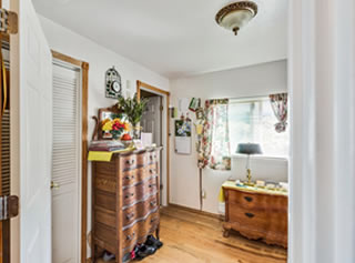 Antique dressers in bedrooms.